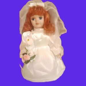 Vintage 8" Bride Porcelain Doll. Red Hair. Complete with boquet